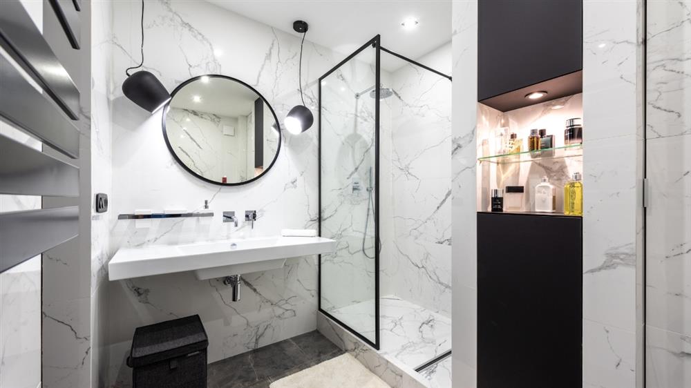 Modern bathroom with stylish pendant lighting